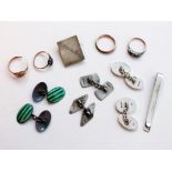 A mixed lot comprising four gold rings gross wt. 3.9g, two pairs of silver cufflinks, a silver tie