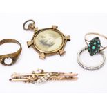 A mixed lot comprising a 9ct gold ring and two others, a 9ct gold seed pearl bar brooch and a