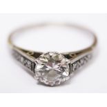 A diamond solitaire ring. Centre stone approx. 0.80 carats. Gross wt. 2.7g. Size M