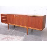 A McIntosh teak sideboard circa 1970. W213.5cm D47cm H75cm