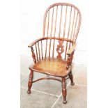 A 19th Century Windsor chair. H99cm