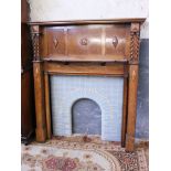 A 1920s oak fire surround with blue tile back. W154cm D24cm H174cm