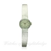 A LADIES 18K SOLID WHITE GOLD PATEK PHILIPPE BRACELET WATCH CIRCA 1960s, REF. 3266/136 RETAILED BY