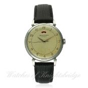 A GENTLEMAN'S STAINLESS STEEL JAEGER LECOULTRE POWERMATIC WRIST WATCH CIRCA 1950 D: Silver dial with