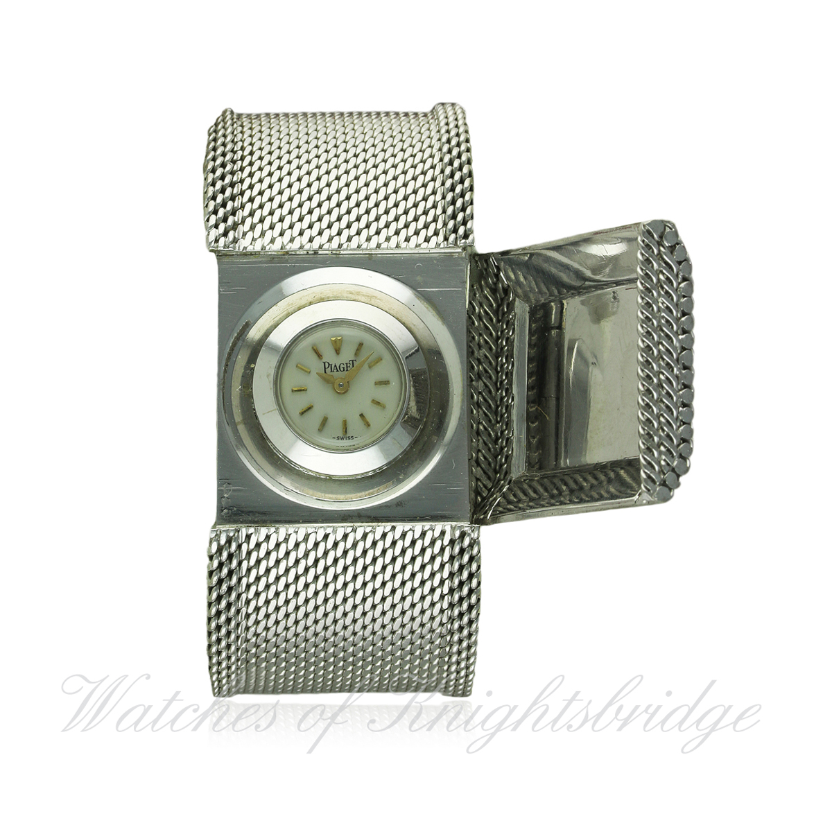 A LADIES 18K SOLID WHITE GOLD PIAGET BRACELET WATCH DATED 1960s
D: Silver dial with gilt batons &