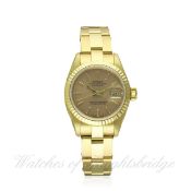 A LADIES 18K SOLID GOLD ROLEX OYSTER PERPETUAL DATEJUST BRACELET WATCH CIRCA 1990, REF. 69173 
D: