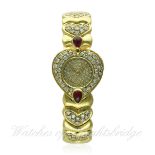 A LADIES 18K SOLID GOLD DIAMOND & RUBY BANGLE WATCH CIRCA 1990s, REF. 007
D: Pave set diamond