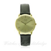 A GENTLEMAN'S 18K SOLID GOLD PIAGET WRIST WATCH CIRCA 1980
D: Champagne dial with black inlaid