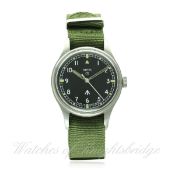 A GENTLEMAN'S STAINLESS STEEL BRITISH MILITARY SMITHS WRIST WATCH CIRCA 1960s
D: Black dial with