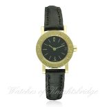 A LADIES 18K SOLID GOLD BULGARI WRIST WATCH CIRCA 1990, REF. BB 23 GLD D: Black dial with gilt