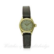 A LADIES 18K SOLID GOLD ROLEX OYSTER WRIST WATCH CIRCA 1950s, REF. 6525
D: Silver dial with gilt "