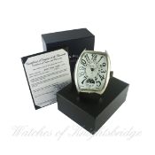 A FRANCK MULLER DUAL TIME ALARM DESK CLOCK DATED 2007 WITH ORIGINAL BOX & PAPERS
D: Silver dial with