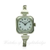 A LADIES SOLID SILVER ROLEX "CUSHION" BRACELET WATCH CIRCA 1920s
D: White enamel dial with Arabic