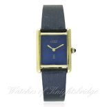 A LADIES SILVER GILT MUST DE CARTIER WRIST WATCH CIRCA 1990s D: Lapis lazuli effect dial with gilt