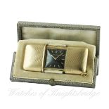 A RARE 9CT SOLID GOLD MOVADO EMERTO CHRONOMETER TRAVEL WATCH CIRCA 1930s IN ORIGINAL FITTED BOX
D: