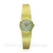 A LADIES 18K SOLID GOLD OMEGA BRACELET WATCH CIRCA 1969, REF. B28321
D: Silver dial with black &