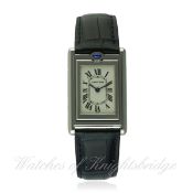A MID SIZE STAINLESS STEEL CARTIER TANK BASCULANTE WRIST WATCH CIRCA 2002, REF. 2405 WITH CARTIER