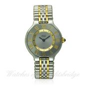 A LADIES STEEL & GOLD CARTIER 21 BRACELET WATCH CIRCA 1990s, REF 1340
D: Silver dial with gilt inner