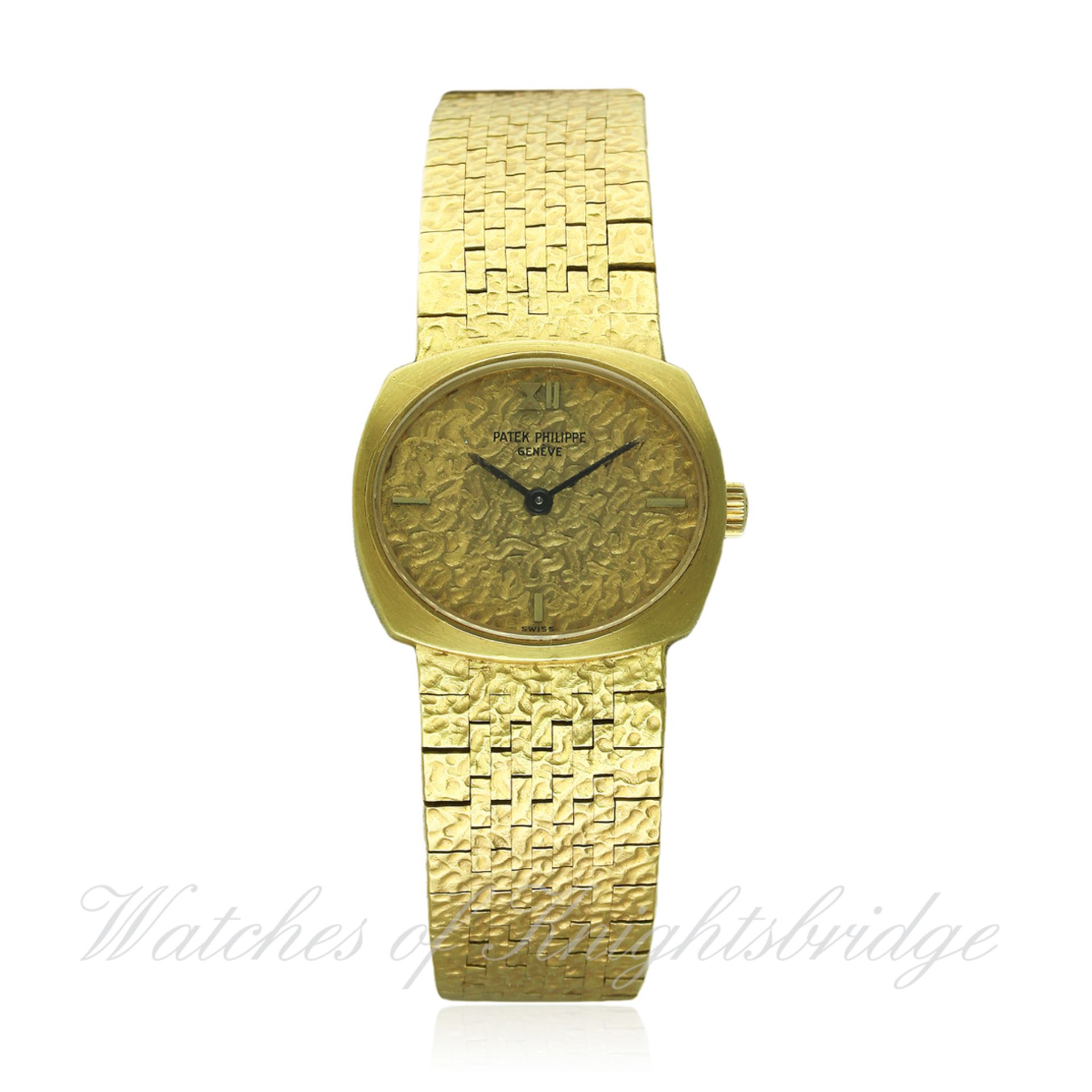 A LADIES 18K SOLID GOLD PATEK PHILIPPE BRACELET WATCH CIRCA 1970s, REF. 4104 1
D: Gold embossed dial