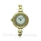 A LADIES LEFT HANDED 9CT SOLID GOLD ROLEX HALF HUNTER BRACELET WATCH CIRCA 1920s
D: White enamel