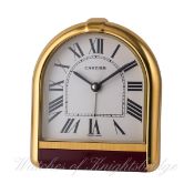 A GILT METAL & LACQUERED CARTIER DESK ALARM CLOCK CIRCA 1990s, REF. 6602
D: White dial with Roman