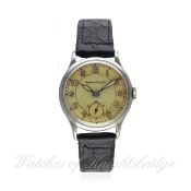 A GENTLEMAN'S STAINLESS STEEL JAEGER LECOULTRE WRIST WATCH CIRCA 1940s
D: Two tone dial with