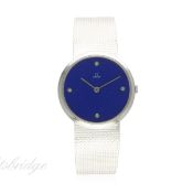 A GENTLEMAN'S 18K SOLID WHITE GOLD BRACELET WATCH CIRCA 1974
D: Lapis lazuli dial with diamond set