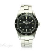 A RARE GENTLEMAN'S STAINLESS STEEL ROLEX OYSTER PERPETUAL "NON-SHOULDERED" SUBMARINER BRACELET WATCH