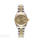 A LADIES STEEL & GOLD ROLEX OYSTER PERPETUAL DATEJUST BRACELET WATCH DATED 1999, REF. 69173 WITH