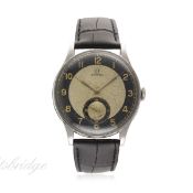 A RARE GENTLEMAN'S LARGE SIZE STAINLESS STEEL OMEGA WRIST WATCH CIRCA 1938
D: Two tone silver &