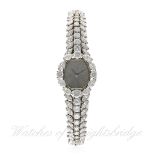 A FINE LADIES PLATINUM & DIAMOND LECOULTRE BRACELET WATCH CIRCA 1970s
D: Sunburst dial. M: 17