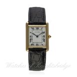 A GENTLEMAN'S 18K SOLID GOLD CARTIER TANK WRIST WATCH CIRCA 1990
D: White dial with black Roman