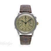 A GENTLEMAN'S TISSOT SINGLE BUTTON CHRONOGRAPH WRIST WATCH CIRCA 1930s
D: Two tone silver dial