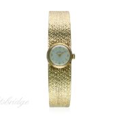 A LADIES 9CT SOLID GOLD OMEGA BRACELET WATCH CIRCA 1968
D: Silver dial with gilt batons &