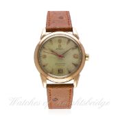 A GENTLEMAN'S 14K SOLID GOLD OMEGA SEAMASTER CALENDAR WRIST WATCH CIRCA 1951, REF. 2627 SC
D: Silver