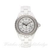 A LADIES MID SIZE WHITE CERAMIC & DIAMOND CHANEL J12 BRACELET WATCH CIRCA 2008
D: White dial with