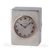 A RARE SOLID SILVER CARTIER TRAVEL CLOCK CIRCA 1920s, REF. 4650
D: Silver guilloche dial with