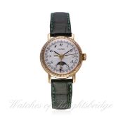 A RARE LADIES 18K SOLID GOLD DOME TRIPLE CALENDAR MOONPHASE WRIST WATCH CIRCA 1980s 
D: Silver