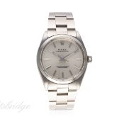A GENTLEMAN'S STAINLESS STEEL ROLEX OYSTER PERPETUAL BRACELET WATCH CIRCA 1959, REF. 1002 WITH ROLEX