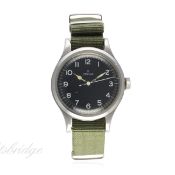 A GENTLEMAN'S STAINLESS STEEL BRITISH MILITARY RAF OMEGA PILOTS WRIST WATCH DATED 1956
D: Black dial