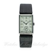 A GENTLEMAN'S STAINLESS STEEL RECTANGULAR IWC WRIST WATCH CIRCA 1940s
D: Silver dial with Arabic