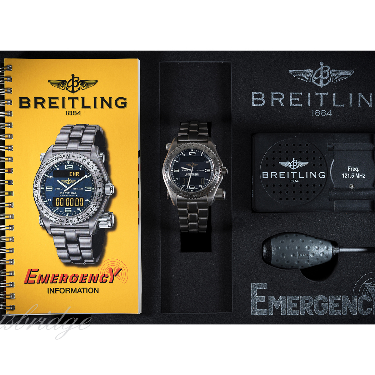 A GENTLEMAN'S TITANIUM BREITLING EMERGENCY BRACELET WATCH WITH COMPLETE BOX SET & PAPERS DATED - Image 2 of 2