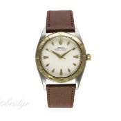 A GENTLEMAN'S STEEL & GOLD ROLEX OYSTER PERPETUAL TURN O GRAPH WRIST WATCH CIRCA 1953, REF. 6202