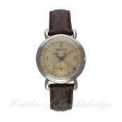 A RARE GENTLEMAN'S STAINLESS STEEL JAEGER LECOULTRE TRIPLE CALENDAR WRIST WATCH CIRCA 1950
D: Two