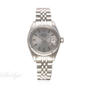 A LADIES STAINLESS STEEL ROLEX OYSTER PERPETUAL DATE BRACELET WATCH CIRCA 1982, REF. 6919
D: