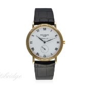 A FINE & RARE GENTLEMAN'S 18K SOLID GOLD PATEK PHILIPPE CALATRAVA WRIST WATCH DATED 1993, REF.