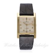 A GENTLEMAN'S 18K SOLID GOLD ZENITH WRIST WATCH CIRCA 1950s D: Silver dial with gilt faceted batons,