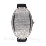 A LARGE STAINLESS STEEL DIAMOND SET WRIST WATCH BY MARCO MAVILLE "OVAL ONE" CIRCA 2010, REF. 1277,