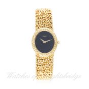 A LADIES 18K SOLID GOLD PIAGET BRACELET WATCH CIRCA 1980s, REF. 9812 D: Black dial with gilt