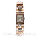 A LADIES SOLID GOLD & DIAMOND GIRARD PERREGAUX BRACELET WATCH CIRCA 1950s D: Two tone silver dial